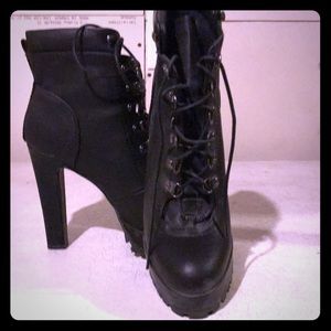 They are high heel over the ankle boots NWOT